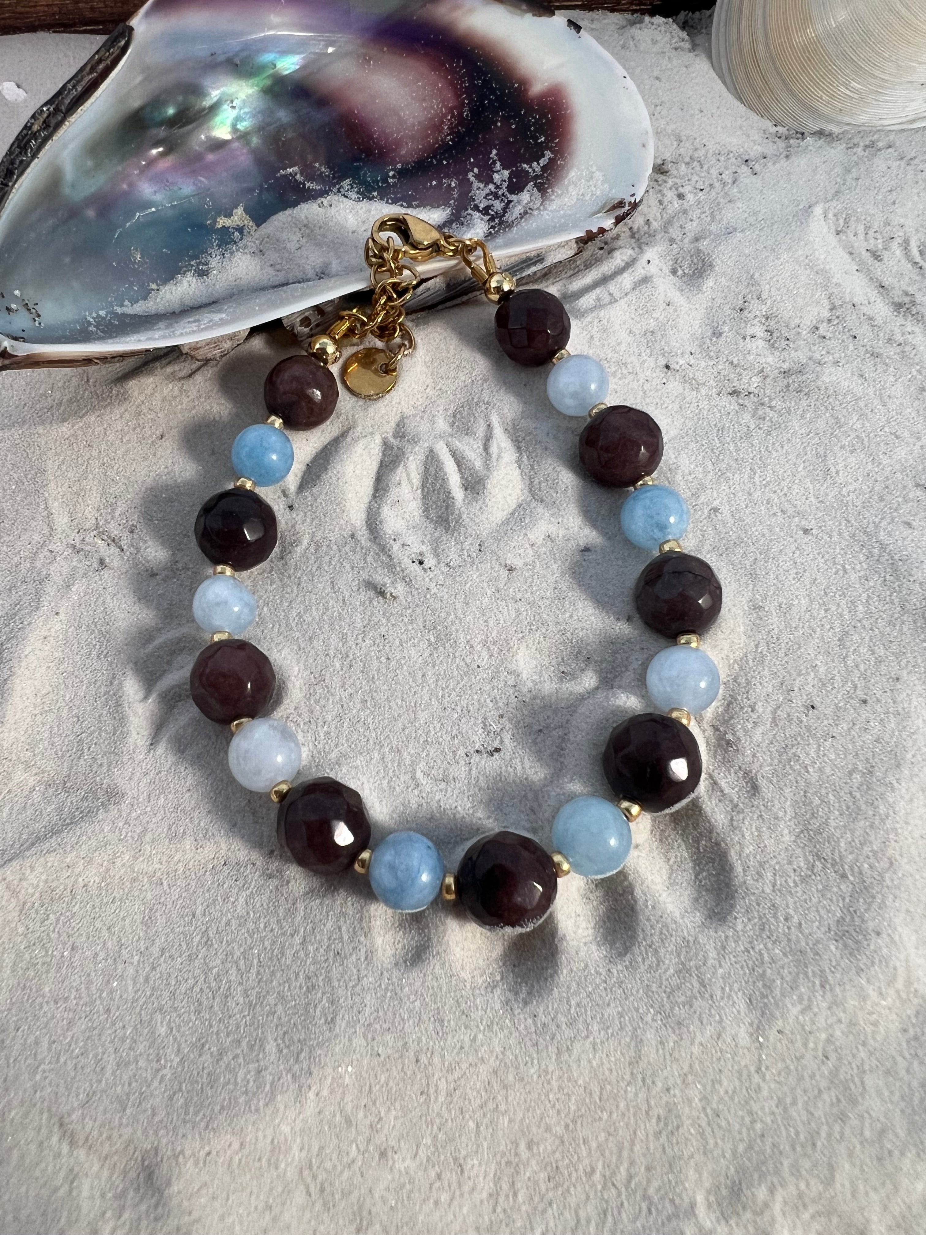 Armbånd lyseblå/brune sten